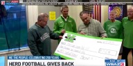 Herd football gives back