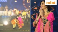 Falguni Pathak touches Nita Ambani's feet as she joins her on stage for garba