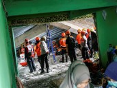 Over 90 people believed buried under rubble after Indonesia school collapse