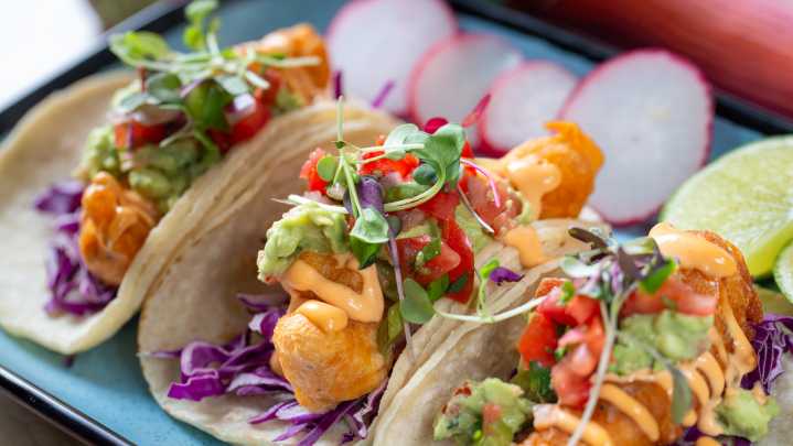 Bring A Briny Burst To Tacos With This Overlooked Canned Seafood