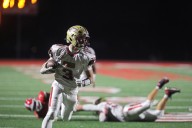 Kane Mathiason scores 3 TDs, powering Davies past Shanley in rivalry clash
