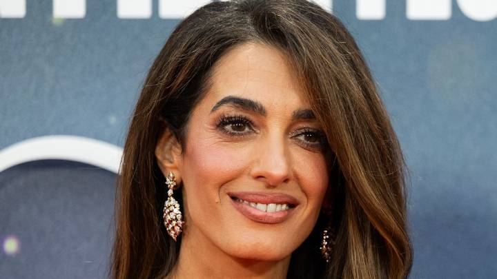 Amal Clooney is the ultimate London party girl in ruffled mini dress