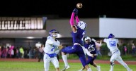 Palisades quarterback Jack Thomas leads his team to high
