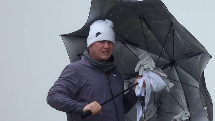 Alfred Dunhill Links Championship: Robert MacIntyre takes share of lead as Storm Amy sees play suspended on day two