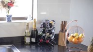 Reuse An Old Kitchen Cabinet To DIY A Wine Rack Like HGTV's Erin Napier Did