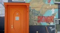 Did Taylor Swift use AI art? 'Life of a Showgirl' orange door videos seem AI