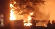 Police issue update on cause after huge fire breaks out on Manchester street as arrest made