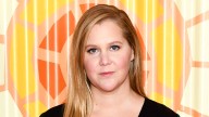 Amy Schumer showcases 40-lb weight loss in tight fitted red dress