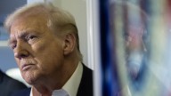 Live updates: Trump arrives in Japan; shutdown hits Day 27