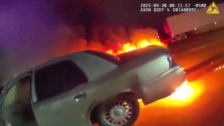 WATCH: Pulse-Pounding Footage Shows Cop Saving Woman Trapped in Burning Car