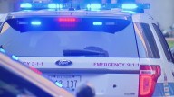1 in custody after pair shot in Chicago garage