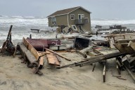 5 homes collapse into the Outer Banks surf as Atlantic hurricanes swirl far offshore