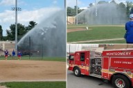 Maryland firefighters charged after flooding baseball field with truck hose during long