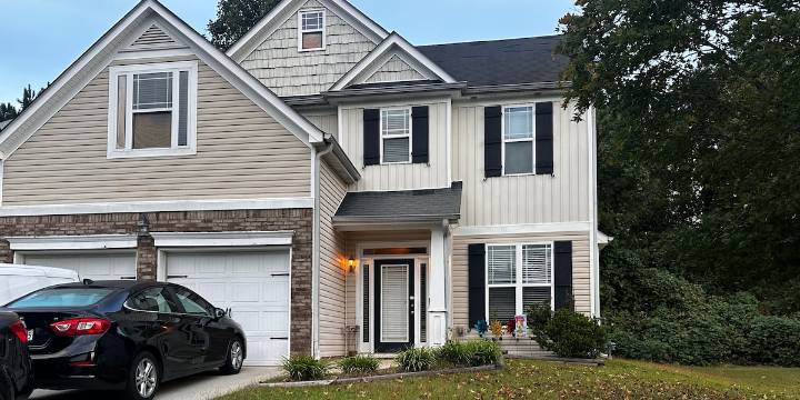 Wife shot and killed by husband outside Ga. home, officials say
