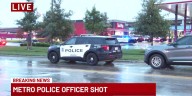 Officer injured, suspect in custody after shooting West Omaha gas station
