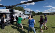 Helicópteros de la Guardia Nacional rescatan a enfermos de zonas incomunicadas tras inundacion...