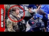 Protester Violently Grabs Mask of ICE Agent in Chicago