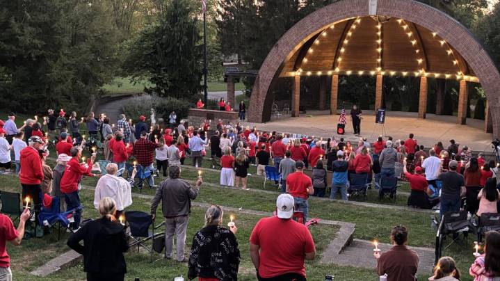 Supporters mark Charlie Kirk’s 32nd birthday with candlelight vigil on National Day of Remembrance