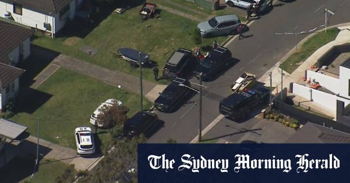 Panania police operation: Wollongbar Avenue flanked by NSW police, emergency service workers