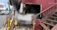 Truck crashes into building in Sagle, 2 people rescued by firefighters