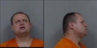 Iowa father charged with abandoning kids found at tavern