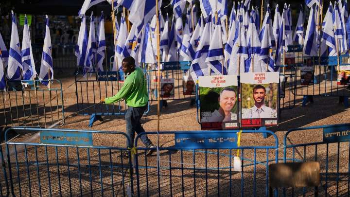 The Latest: Gaza ceasefire holds as Israeli military says Red Cross to transfer remains of deceased