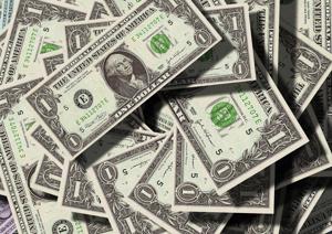 Most Americans spend huge chunk of their paychecks immediately