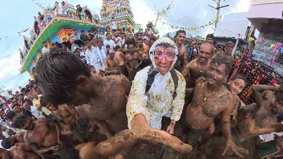 YouTuber under fire for India cow dung festival video. His 'not racist' defence