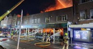Huge fire rips through Poundland shop as 100 firefighters rush to tackle blaze