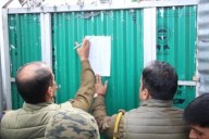 Police attach property of militant handler in Handwara