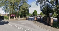 School enters 'partial lockdown' after police called out to 'man seen with gun'