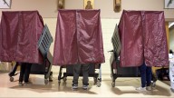 New Orleans election officials secure voting machines before polls open