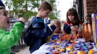 See area children enjoy Iowa City’s downtown trick