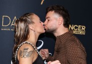 JoJo Siwa and Chris Hughes kiss in red carpet debut before he cries over love for her