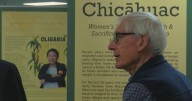 Gov. Evers tours new UWEC history exhibit highlighting the families migrant workers leave behind