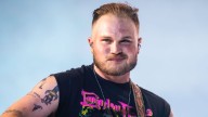 Zach Bryan Reacts To Criticism Over New Song Mentioning ICE Saying It Will Hit "Both Sides Of The Aisle": "I'm On Neither Of These Radical Sides"