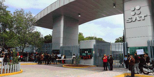 SAT, abierto al diálogo con trabajadores después del paro de labores