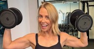 Channel 4 beauty flexes eye-popping muscles in teeny sports bra and leggings
