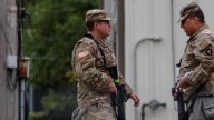 Trump threatens Insurrection Act as he sends troops to Chicago
