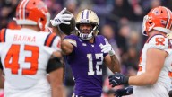 Denzel Boston's big day helps Washington beat No. 23 Illinois and match its 2024 win total