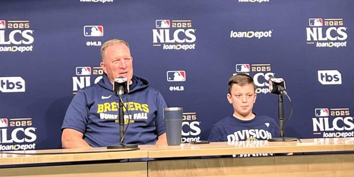 Pat Murphy's son answers reporter's questions at NLCS