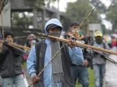 Anti-Trump protesters fire arrows at Colombian police, injuring 4