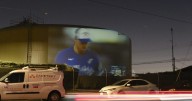 Remember the Dodgers fans who projected the World Series on an East LA water tank? They’re at it again