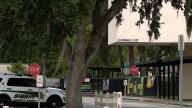 Florida school employee had thoughts of killing student, report says