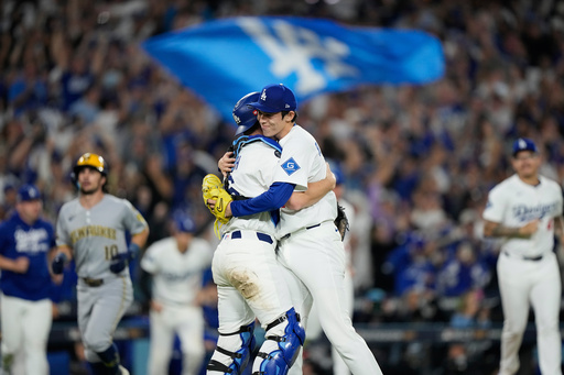 Shohei Ohtani hits 3 homers, dominates on mound in Dodgers' clinching 5