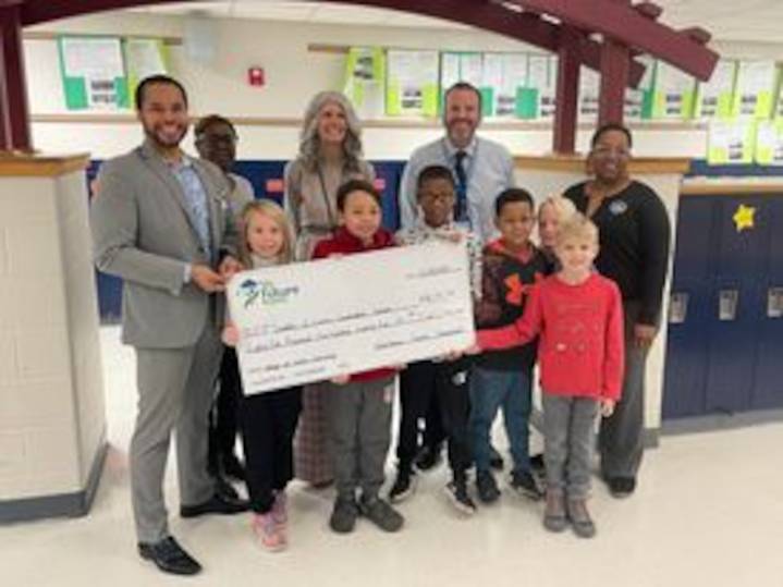 Early scholarship program hits $2M milestone, helps kids in Ann Arbor area save for college