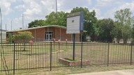 Holy Cross employee investigated for secret recordings of students changing, employee having sex with another adult