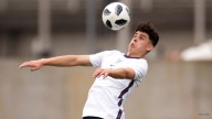 Third-generation Socceroo Robertson back in Australia fold