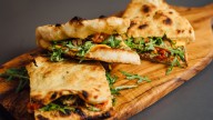 This Once-Popular 2000s Flatbread Chain Quickly Vanished. Here's Why