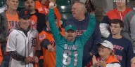 Cal Raleigh home run caught by fan wearing 'Dump Here' shirt